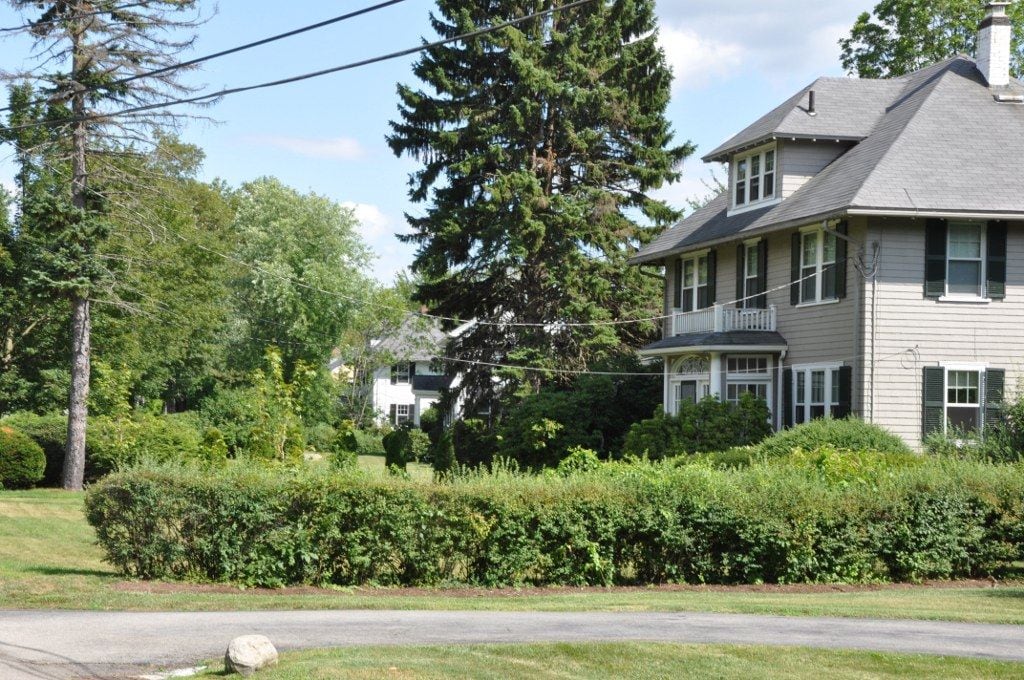 Leafy homes along Glen Road in Weston, Massachusetts
